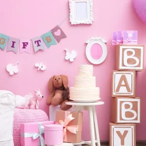 escenario decorado en rosado para fiesta de baby shower para niña
